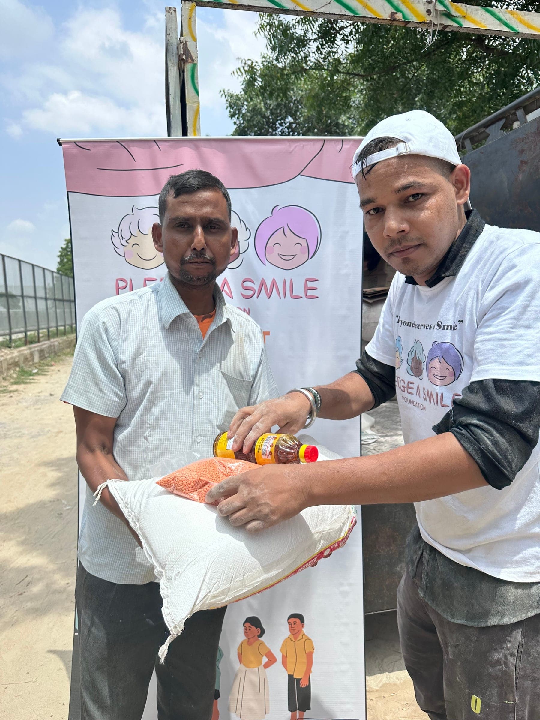 Two teen boys with ration kit, tree canopy setting